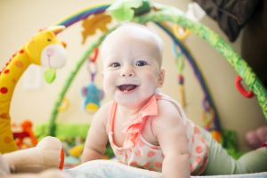 Happy toddler playing indoors