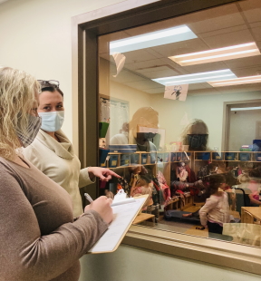 Two teachers observing classroom